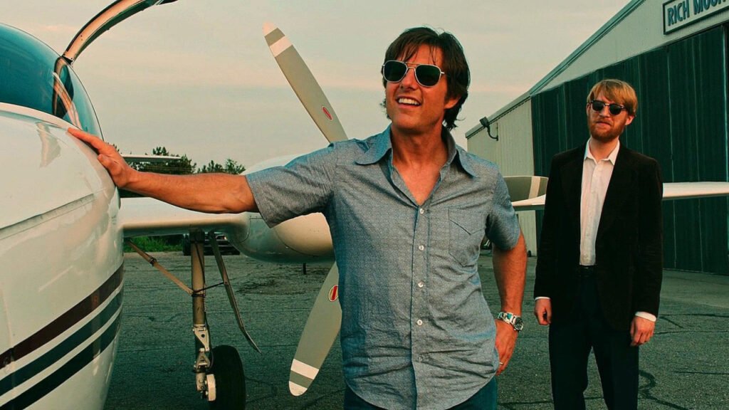 Tom Cruise and Domhnall Gleeson in American Made