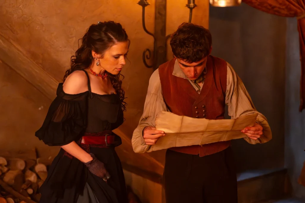 Hayley Atwell as Bess Hawkins and Tom Sweet as Jim Hawkins in Treasure Island