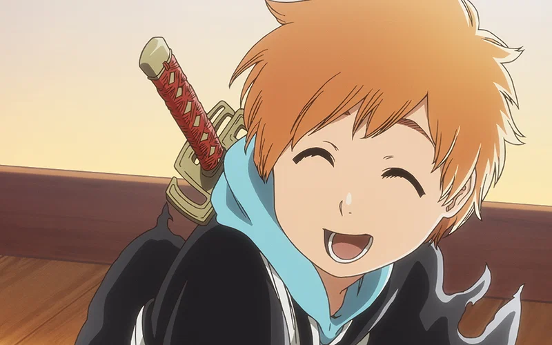 A heartwarming look at a young Kazui Kurosaki flashing a bright, joyful smile with his miniature sword strapped to his back in the Bleach universe.