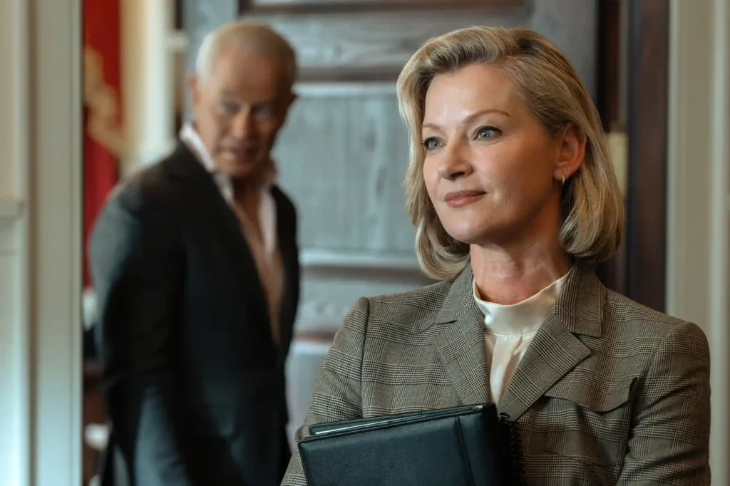 Neal McDonough as Cal Thresher and Gretchen Mol as Amanda Clark in ‘Tulsa King' season 4.